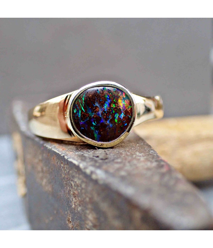asymmetrischer Ring aus Gelbgold mit Matrix-Opal